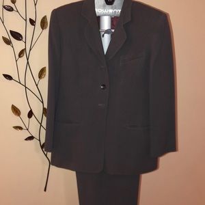 Women’s gray executive power suit.